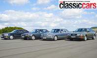 Lexus LS400/BMW 735i/Mercedes 420 SE/Audi V8 fahrend von schräg vorne fotografiert.