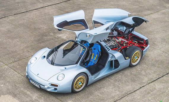 Isdera Commendatore 112i Frontansicht Motorhaube und Türen offen